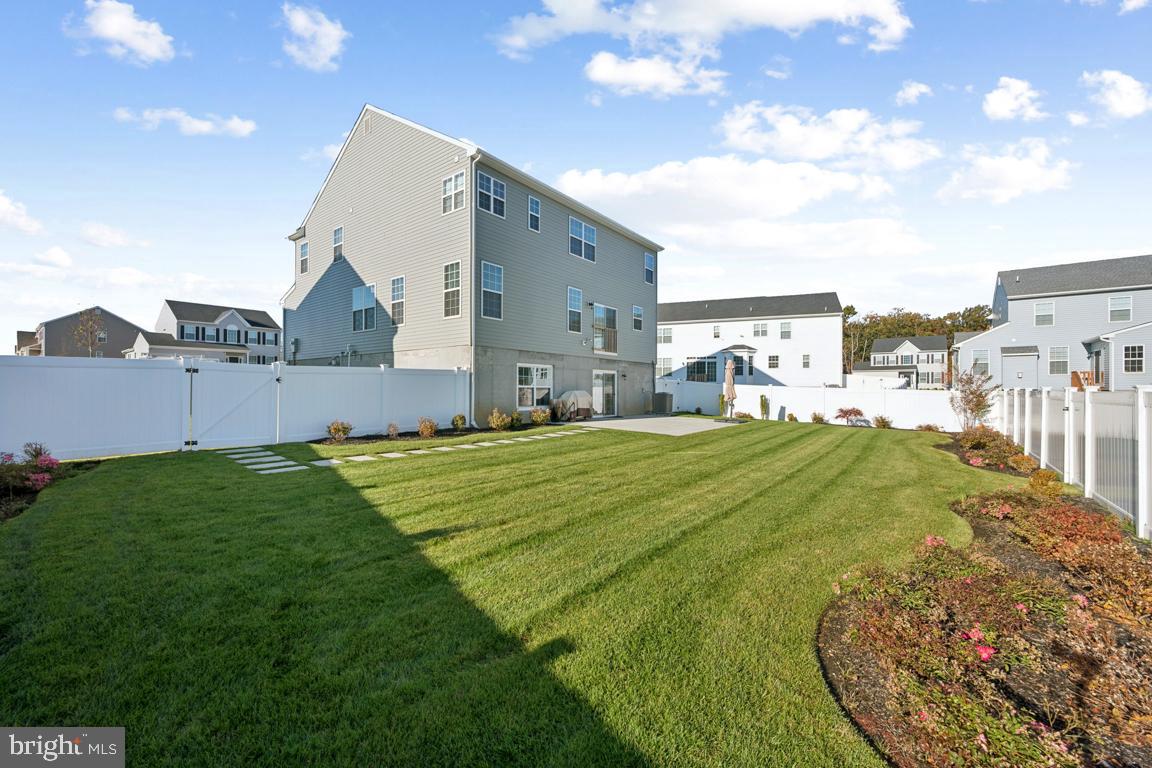 30 Champlain Road Marlton, NJ 08053 - Photo 30 of 30 a view of a house with a big yard potted plants and a tree