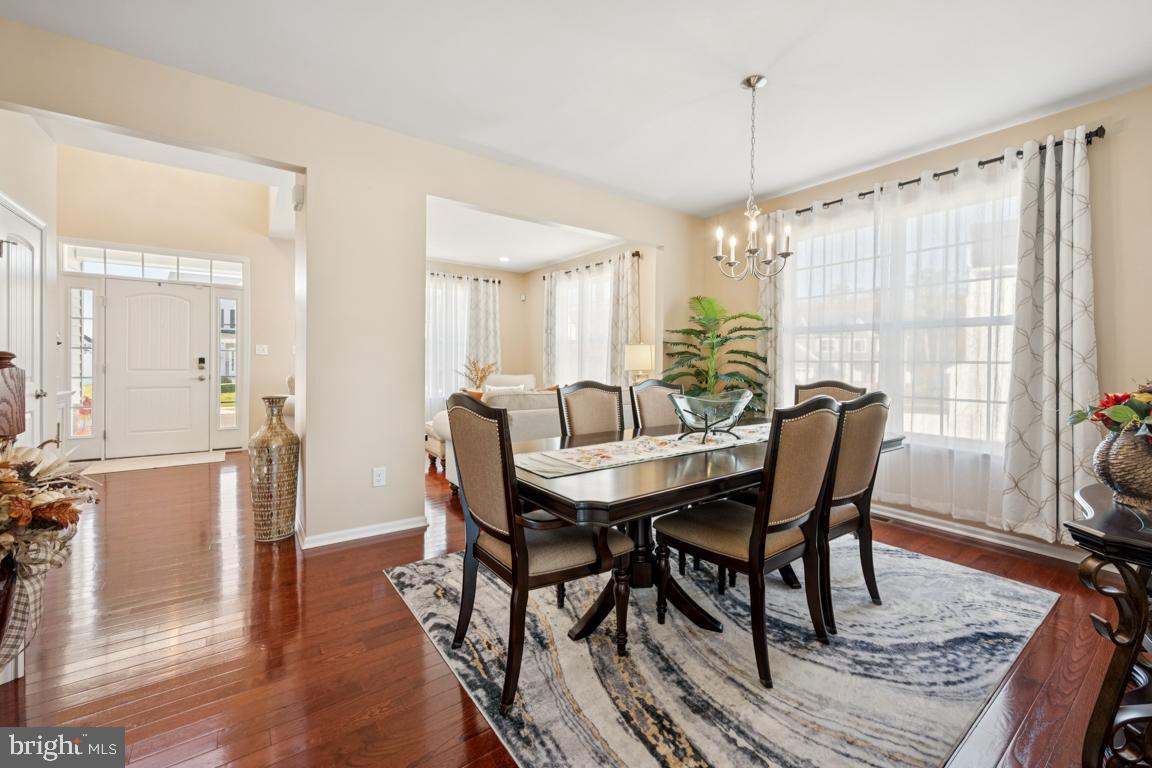 30 Champlain Road Marlton, NJ 08053 - Photo 7 of 30 a view of a a dining room with furniture window and wooden floor