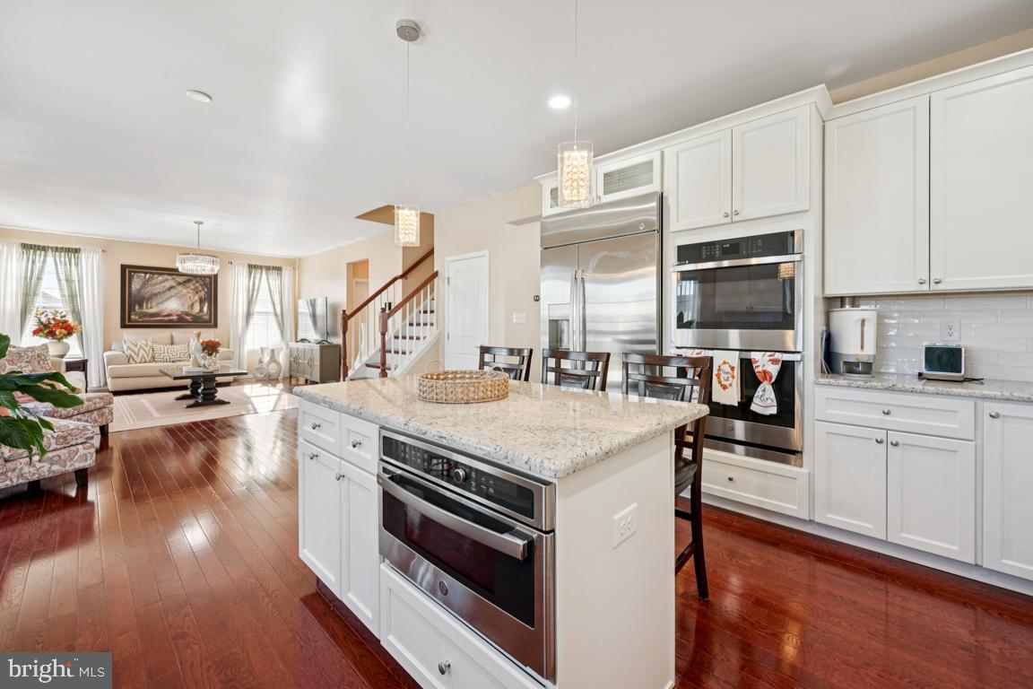 30 Champlain Road Marlton, NJ 08053 - Photo 10 of 30 a kitchen with stainless steel appliances granite countertop a sink stove and refrigerator