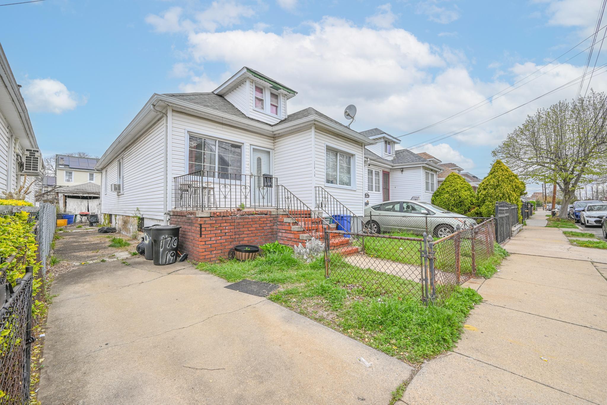 View of front of home with fence