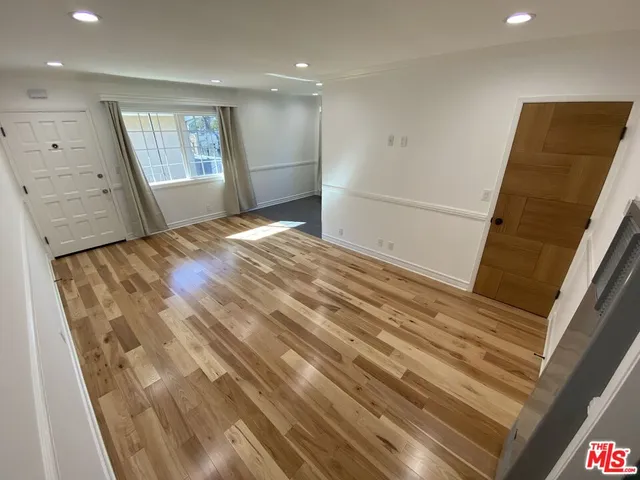 a view of empty room with front door