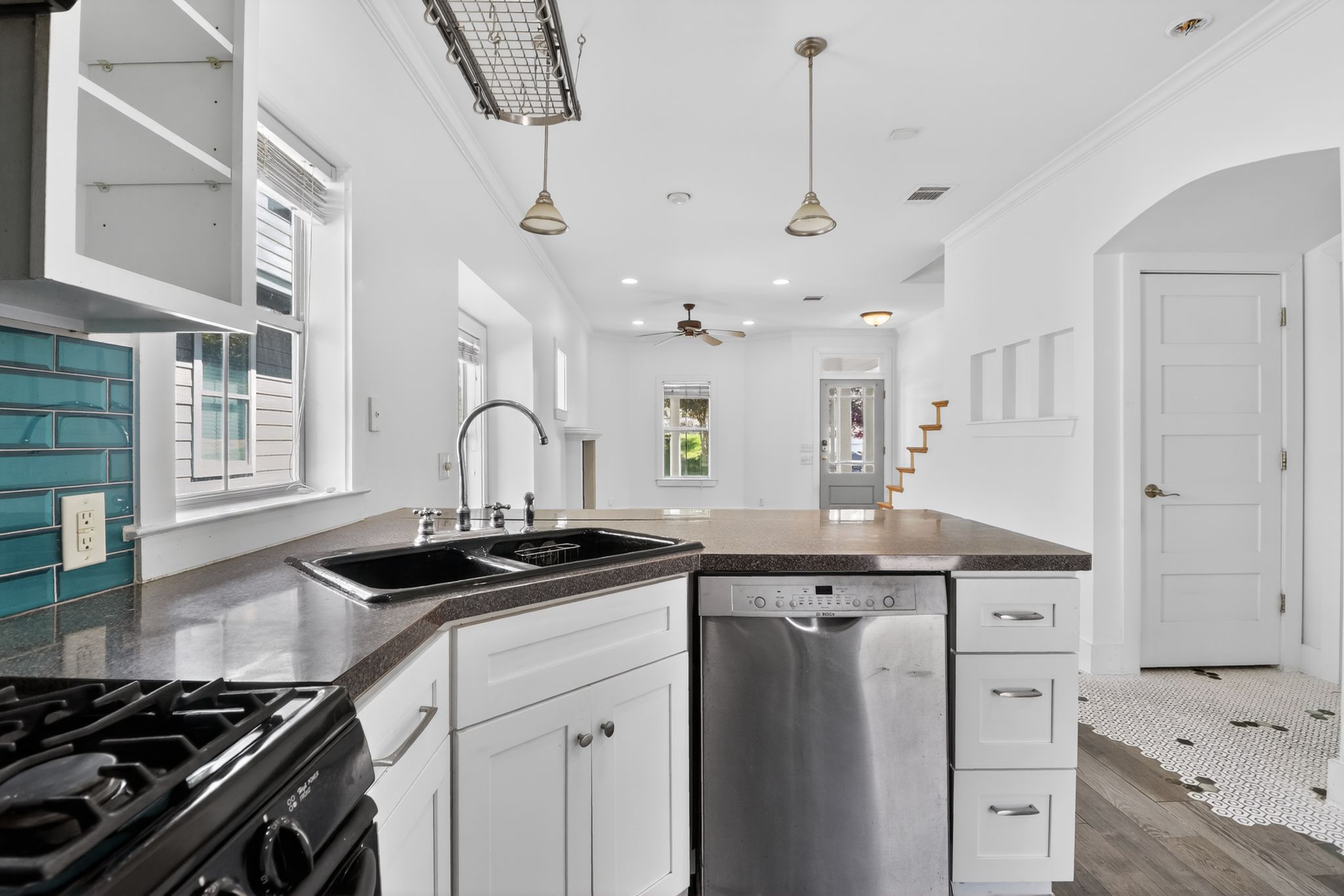 3614 South 2nd Street Austin, TX 78704 - Photo 16 of 40 a kitchen with a sink stove and cabinets