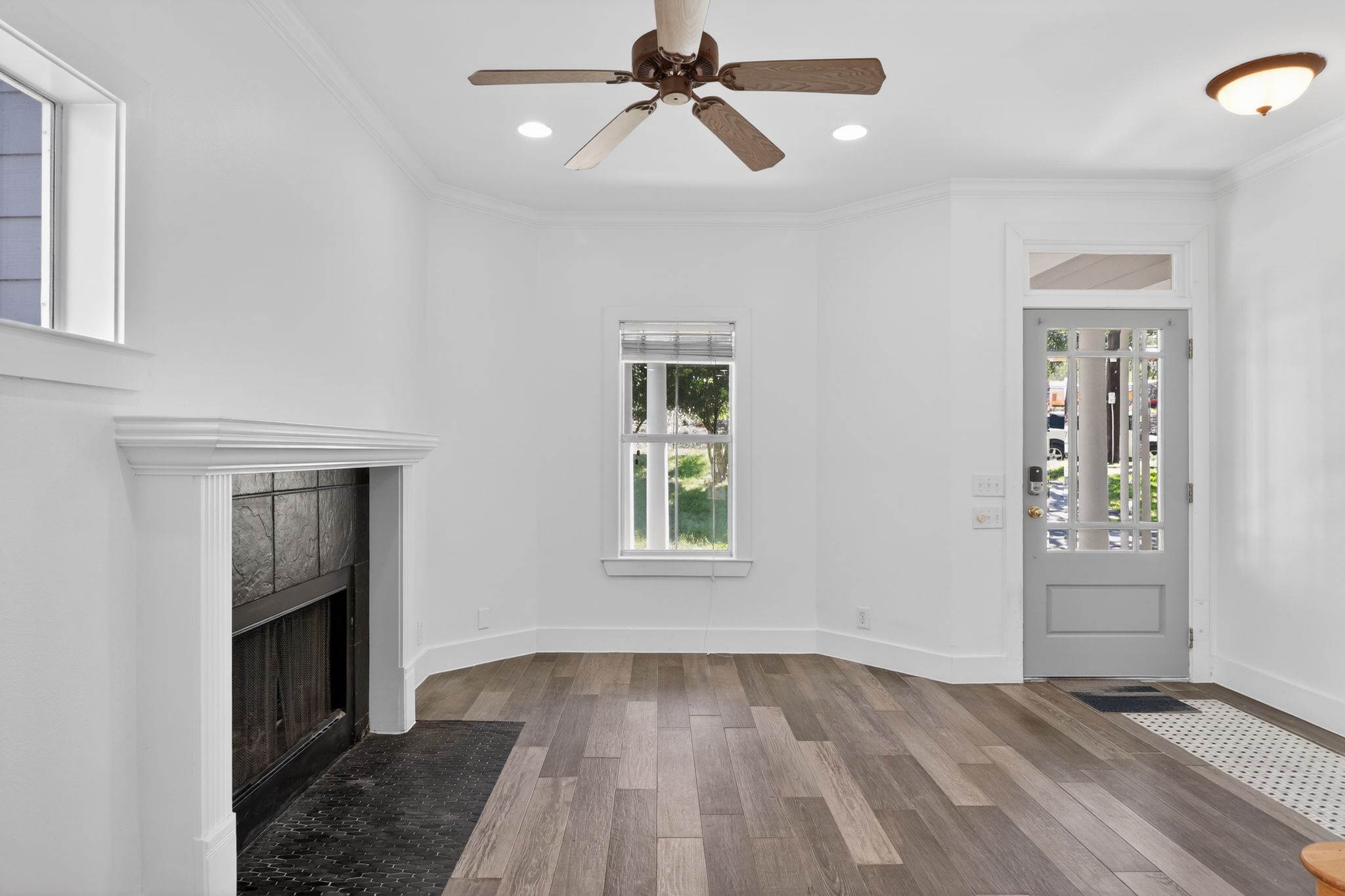 3614 South 2nd Street Austin, TX 78704 - Photo 2 of 40 wooden floor in an empty room with a window