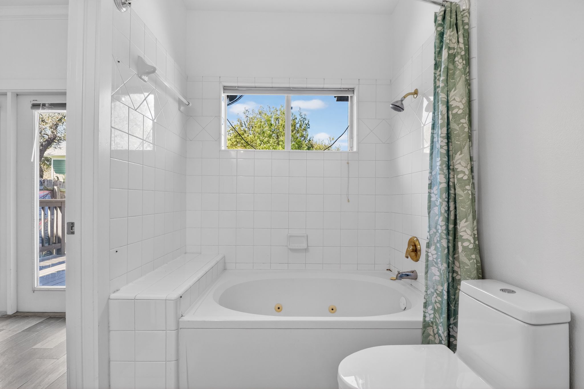 3614 South 2nd Street Austin, TX 78704 - Photo 25 of 40 a bathroom with a toilet and a shower