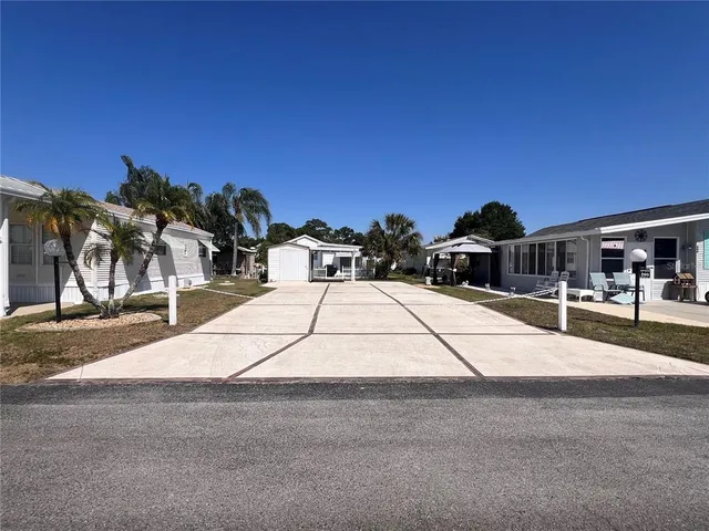 a terrace with outdoor seating and city view