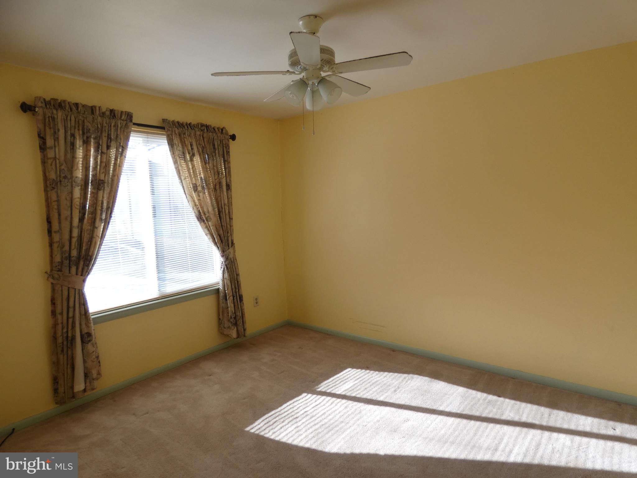 69-3 Azalea Way Reading, PA 19606 - Photo 15 of 16 Bright, airy room Bedroom with soft sunlight glow.