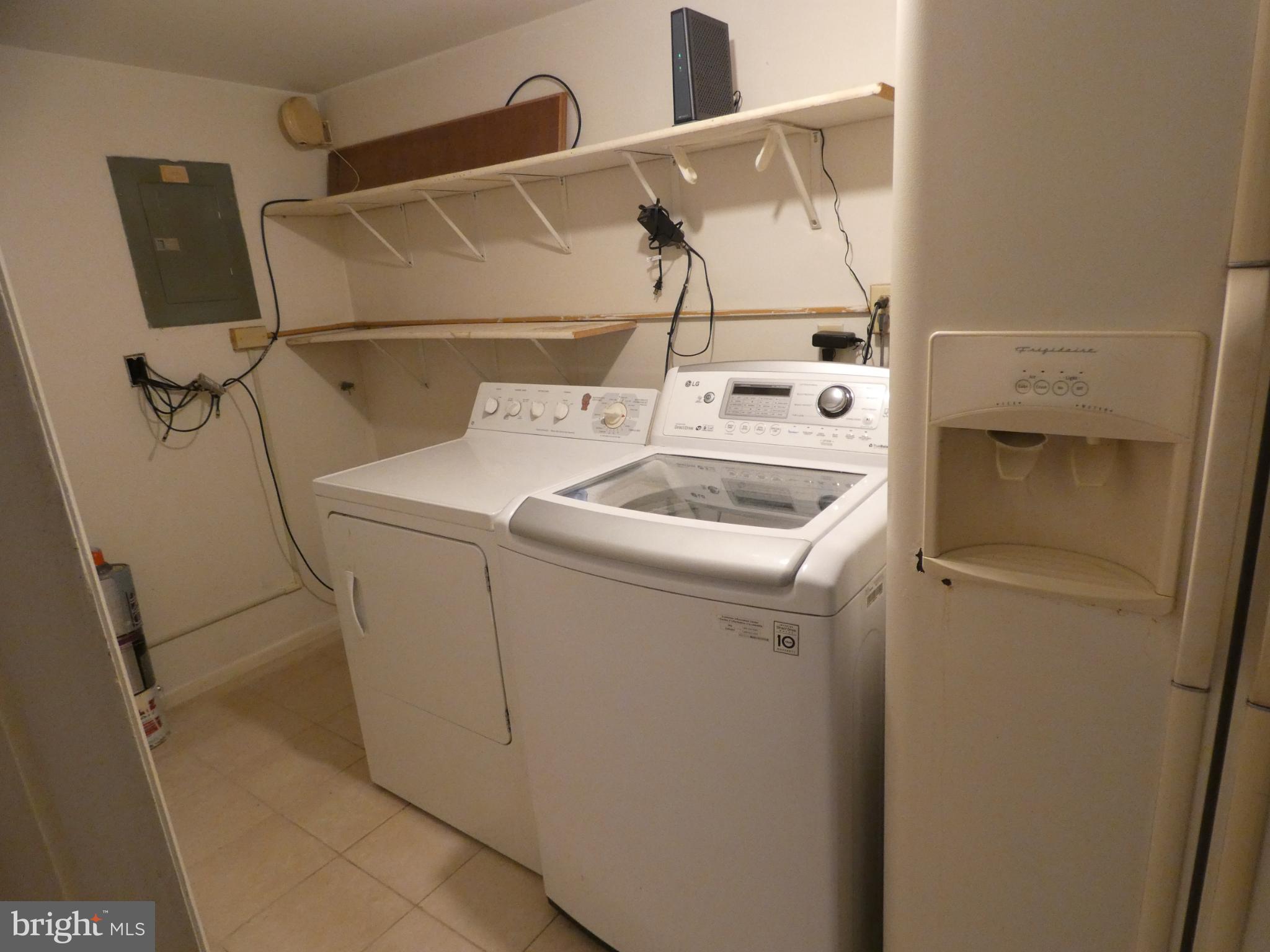 69-3 Azalea Way Reading, PA 19606 - Photo 4 of 16 Functional laundry space with ample storage.