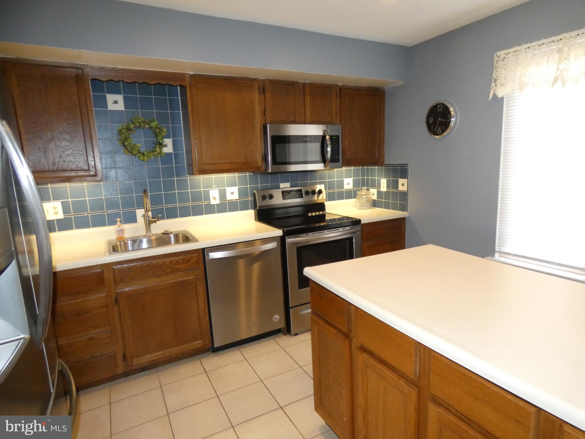 69-3 Azalea Way Reading, PA 19606 - Photo 5 of 16 Modern kitchen with stylish accents.