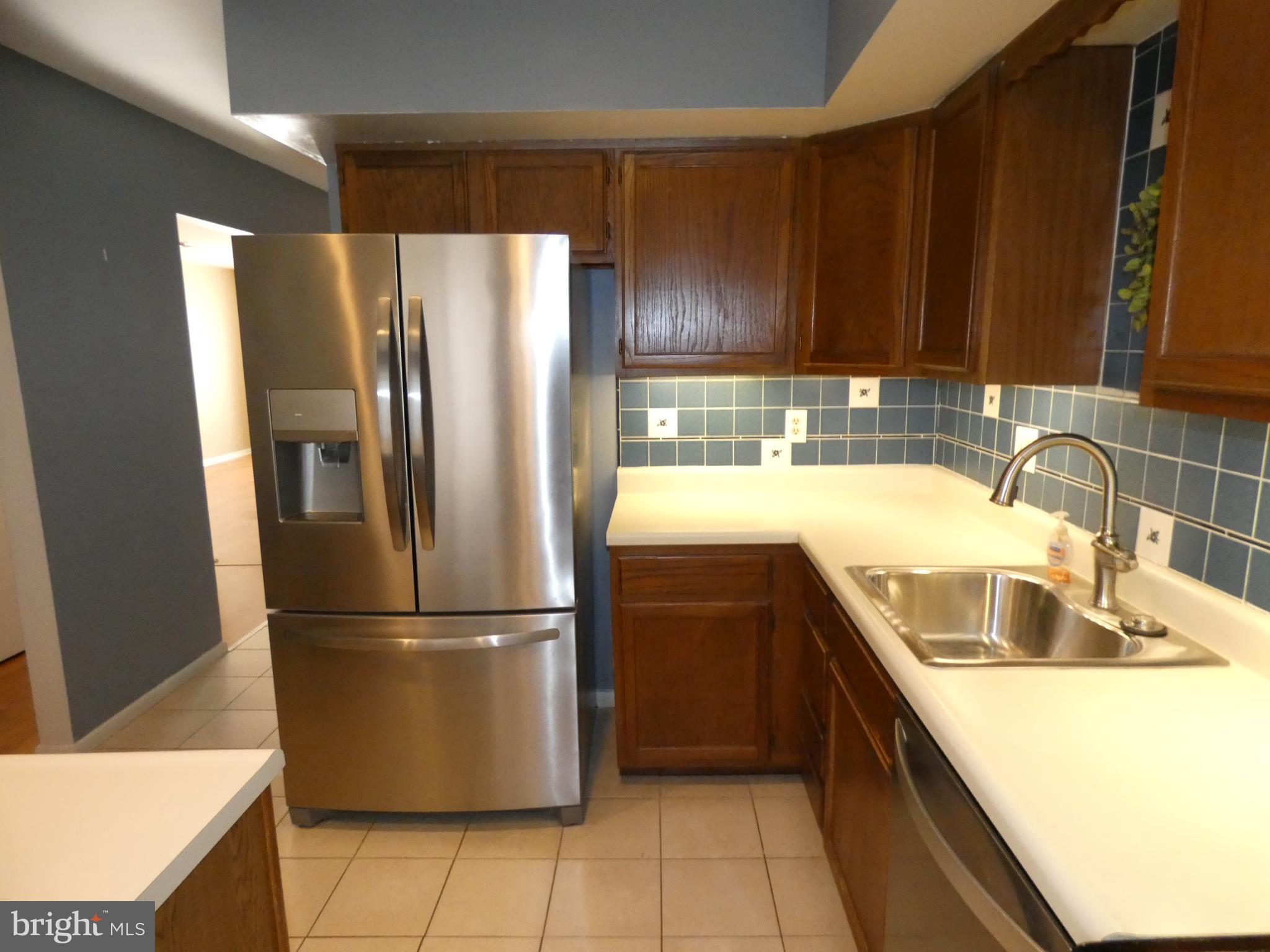 69-3 Azalea Way Reading, PA 19606 - Photo 6 of 16 Modern kitchen with sleek appliances.
