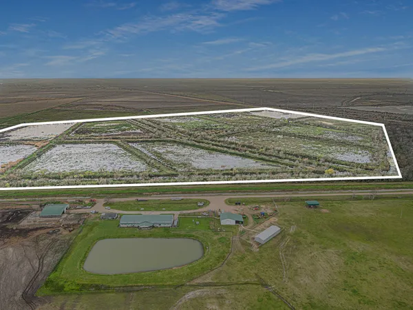 a view of swimming pool from a bathroom