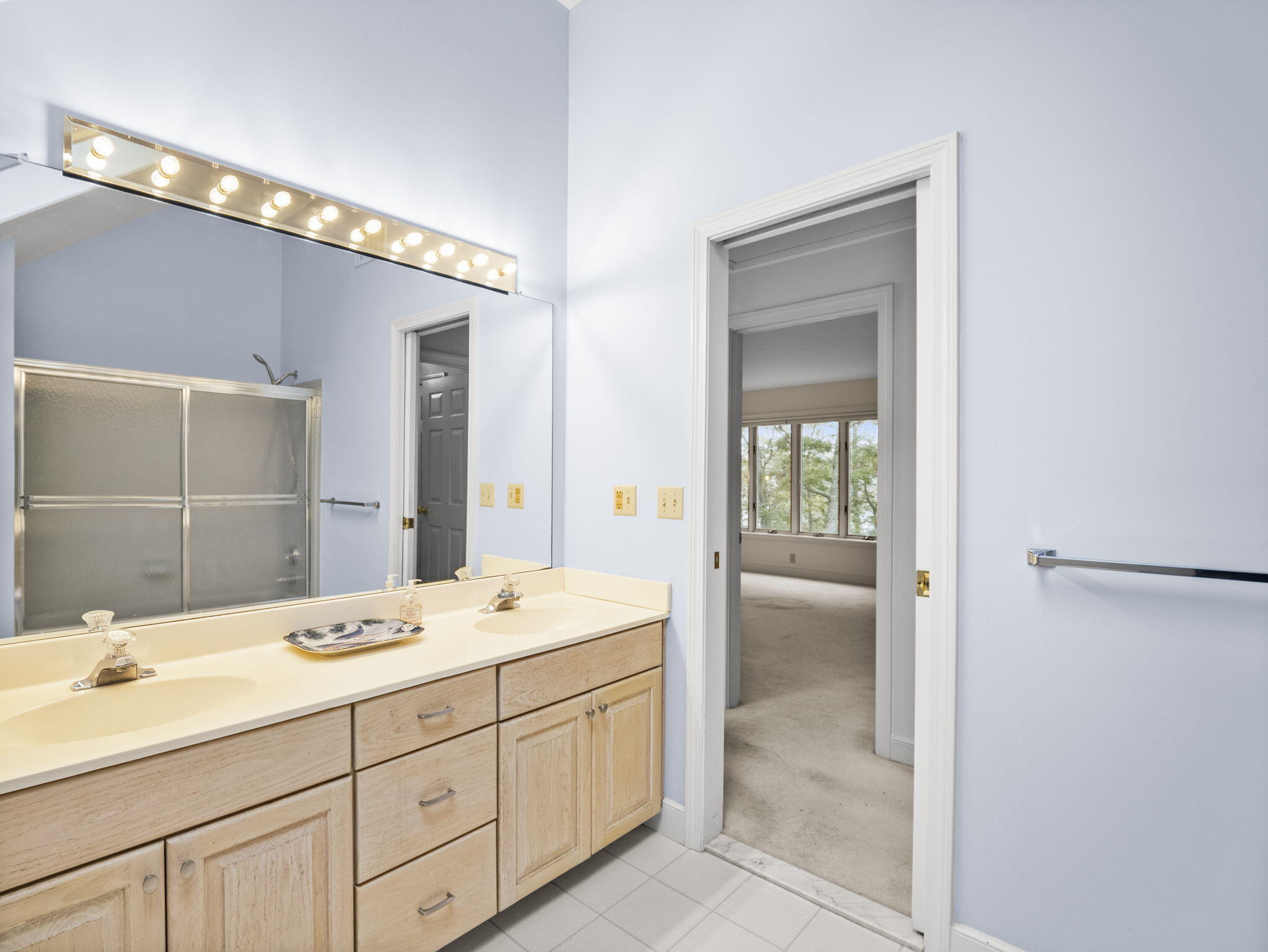 15 Goldie Way Barnstable, MA 02601 - Photo 31 of 48 a bathroom with a double vanity sink and mirror