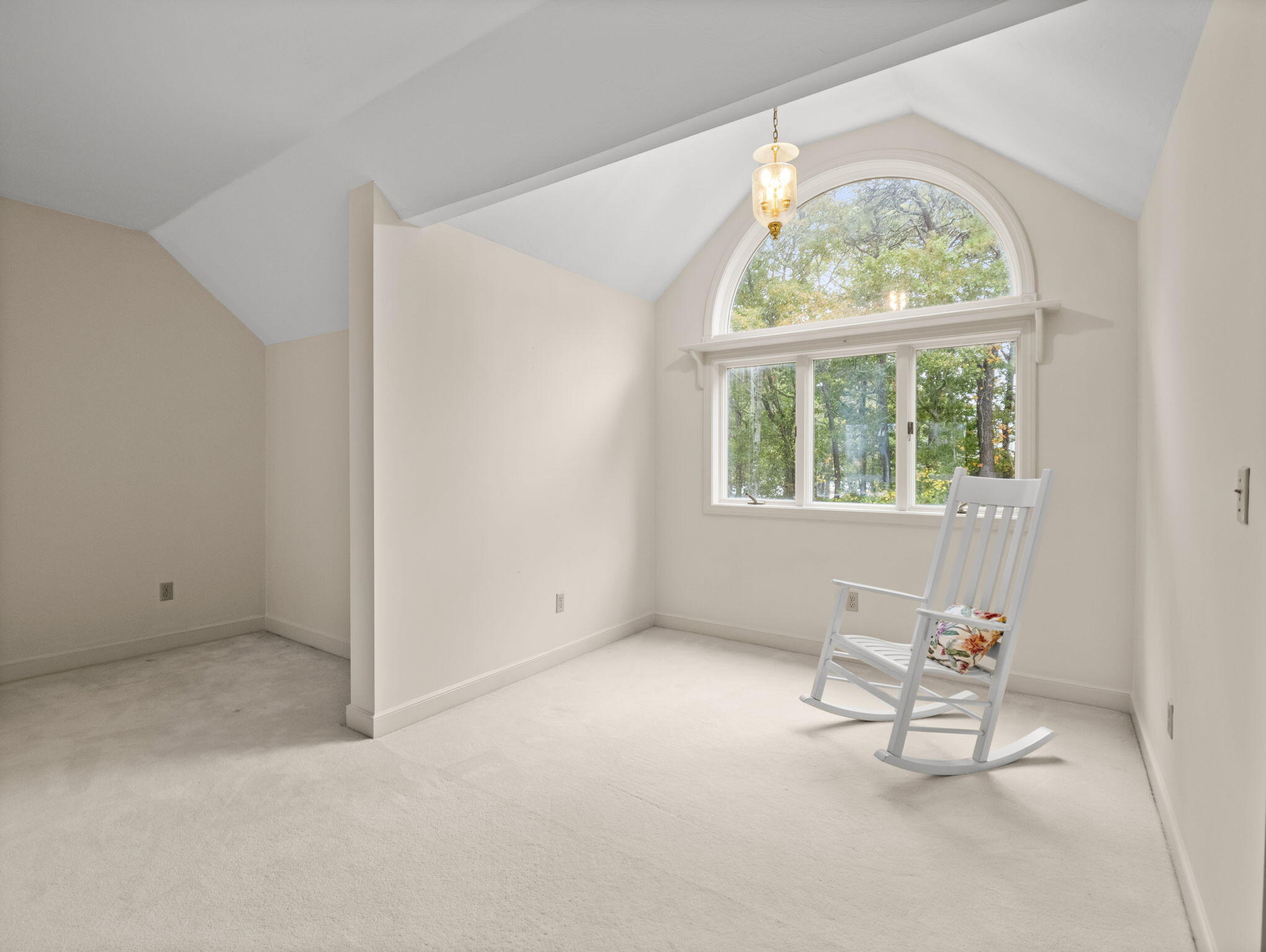 15 Goldie Way Barnstable, MA 02601 - Photo 33 of 48 an empty room with a window and a ceiling fan