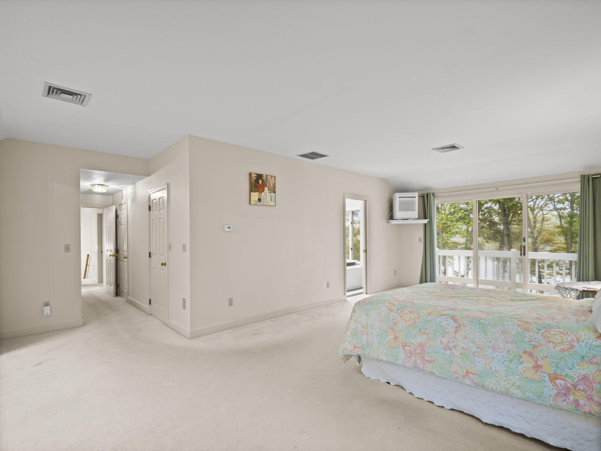 15 Goldie Way Barnstable, MA 02601 - Photo 35 of 48 a bedroom with a large bed and a large window