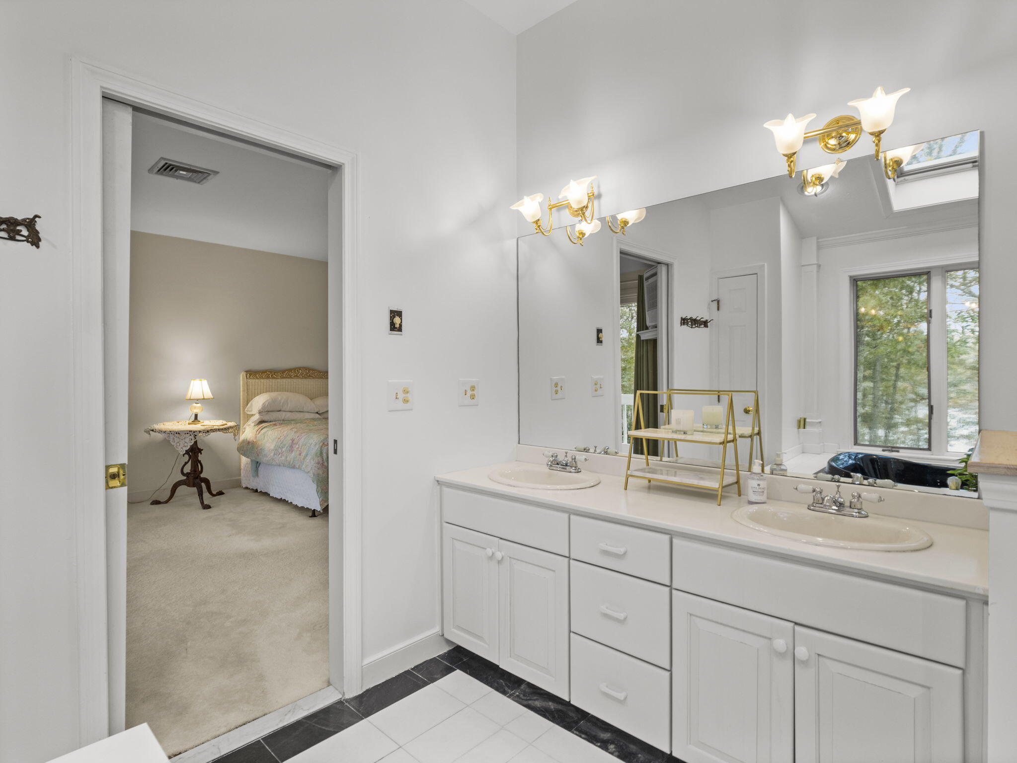 15 Goldie Way Barnstable, MA 02601 - Photo 38 of 48 a bathroom with a double vanity sink and a mirror