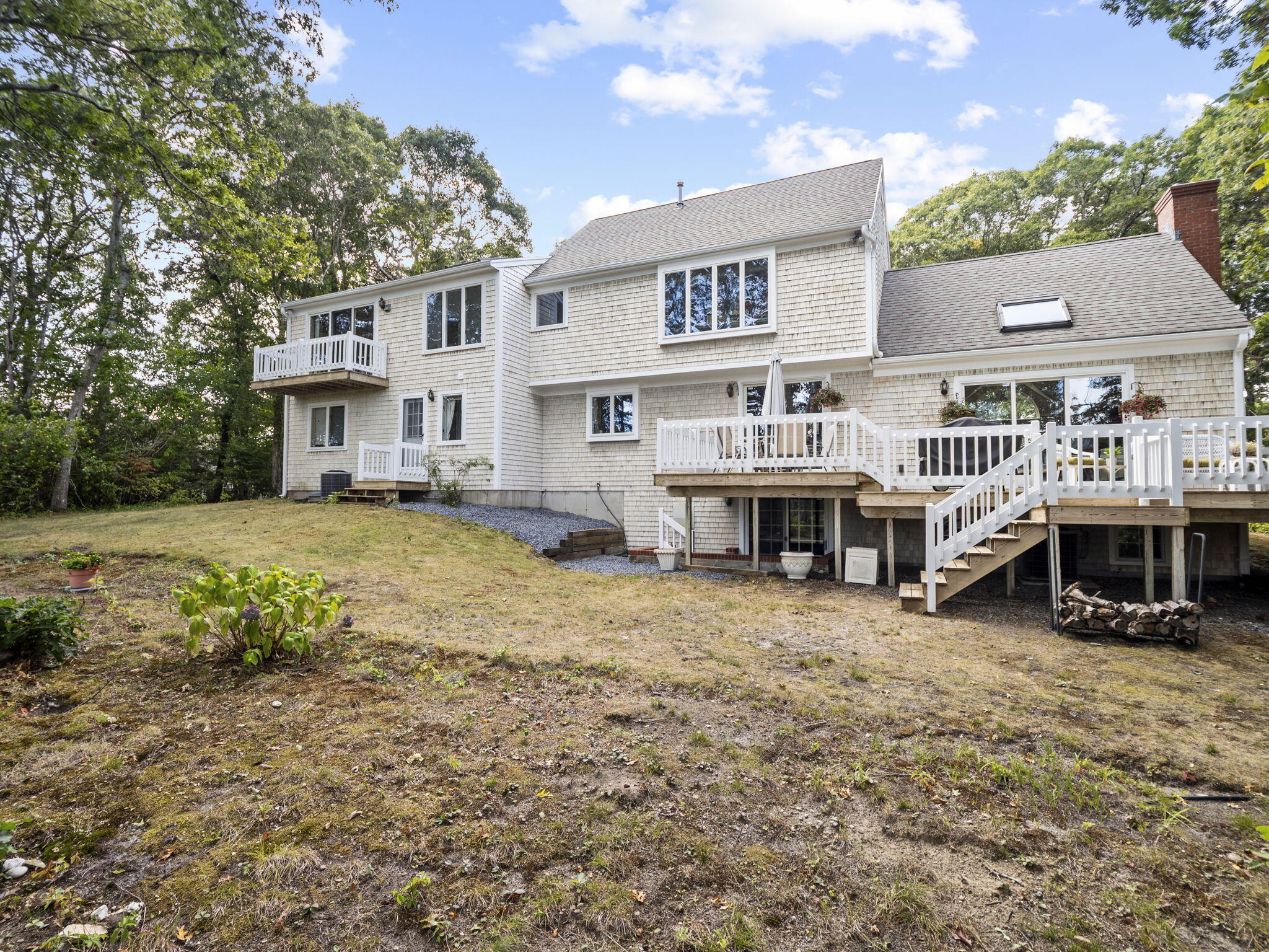 15 Goldie Way Barnstable, MA 02601 - Photo 5 of 48 a view of residential houses with yard and roof