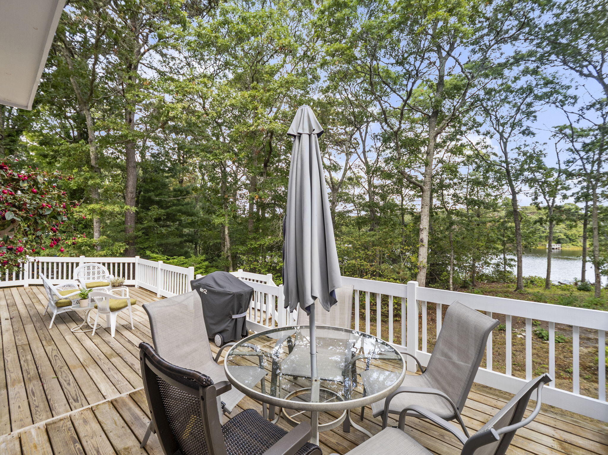 15 Goldie Way Barnstable, MA 02601 - Photo 7 of 48 a view of a patio with a table chairs and a table