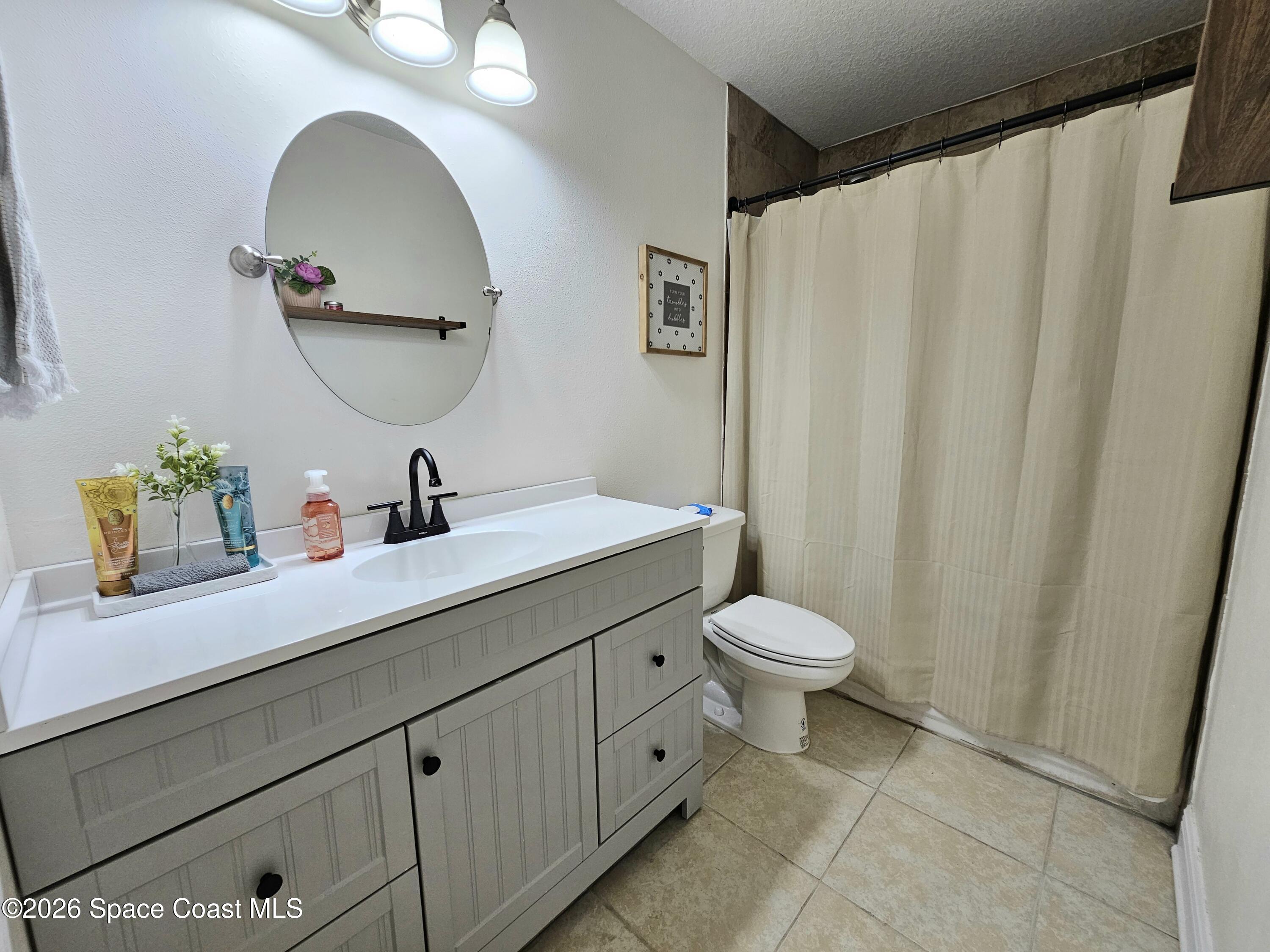 1044 Bernice Road Rockledge, FL 32955 - Photo 15 of 18 Hallway Bathroom