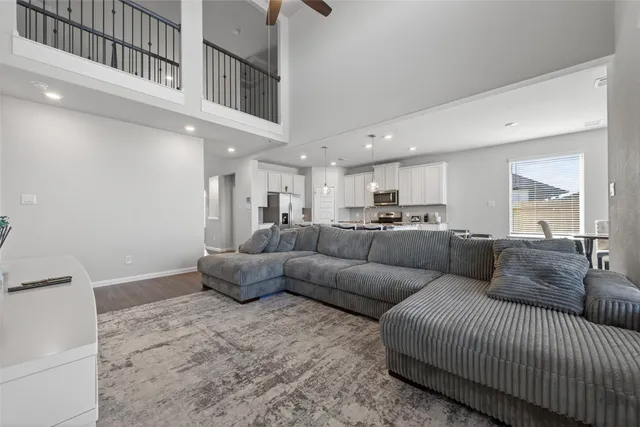 a living room with furniture and a couch