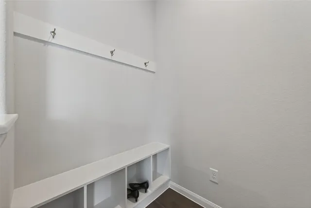 a view of small space with racks on the wall