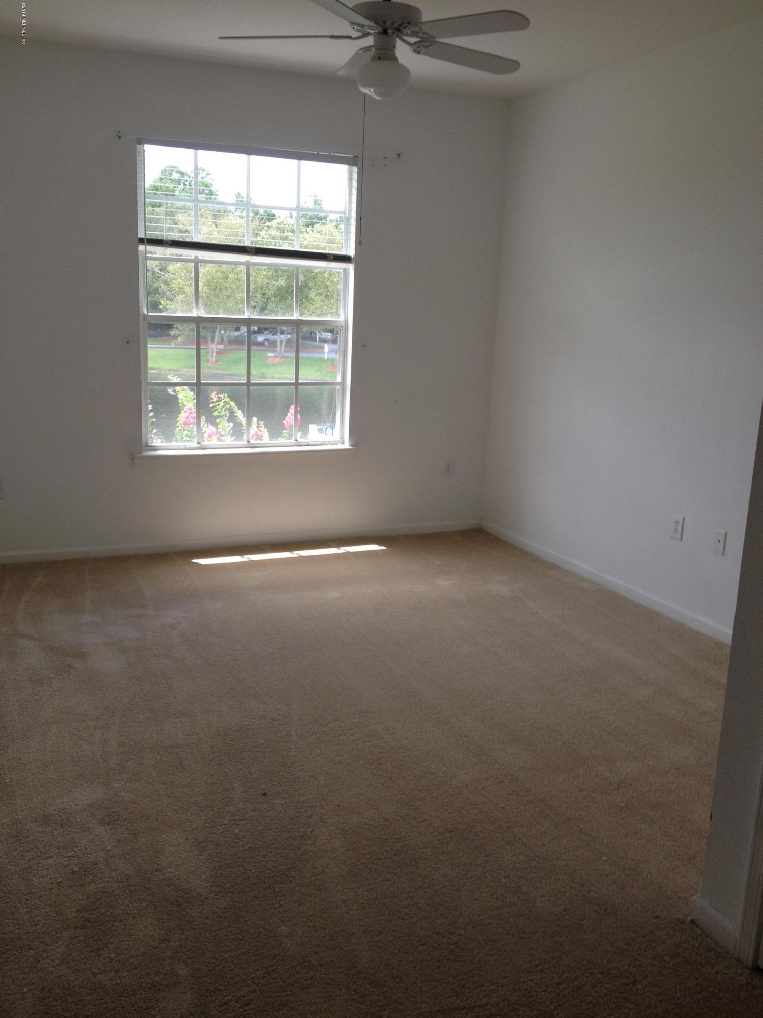 10550 Baymeadows Road, Unit 323 Jacksonville, FL 32256 - Photo 4 of 9 Master Bedroom
