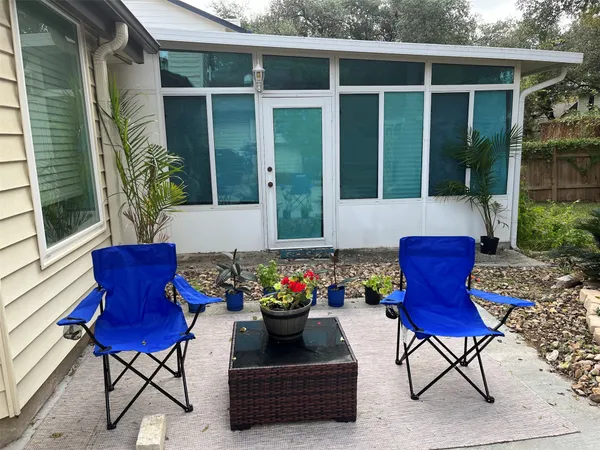 a building outdoor space with patio furniture