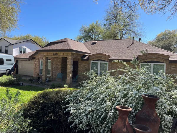 a view of a house with a garden