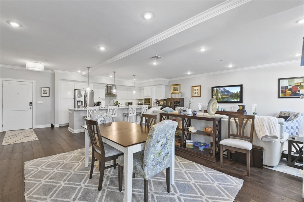 635 Old Post Road, Unit 108 Sharon, MA 02067 - Photo 11 of 42 a view of a dining area with furniture