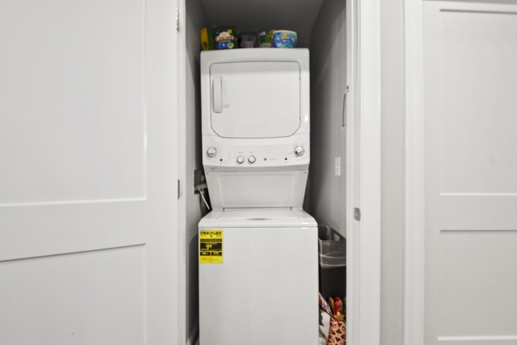635 Old Post Road, Unit 108 Sharon, MA 02067 - Photo 20 of 42 a utility room with dryer and washer