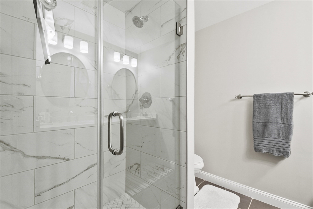 635 Old Post Road, Unit 108 Sharon, MA 02067 - Photo 31 of 42 a bathroom with a shower