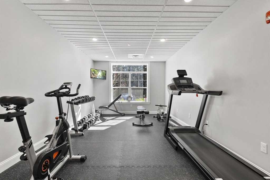 635 Old Post Road, Unit 108 Sharon, MA 02067 - Photo 40 of 42 a view of a room with gym equipment