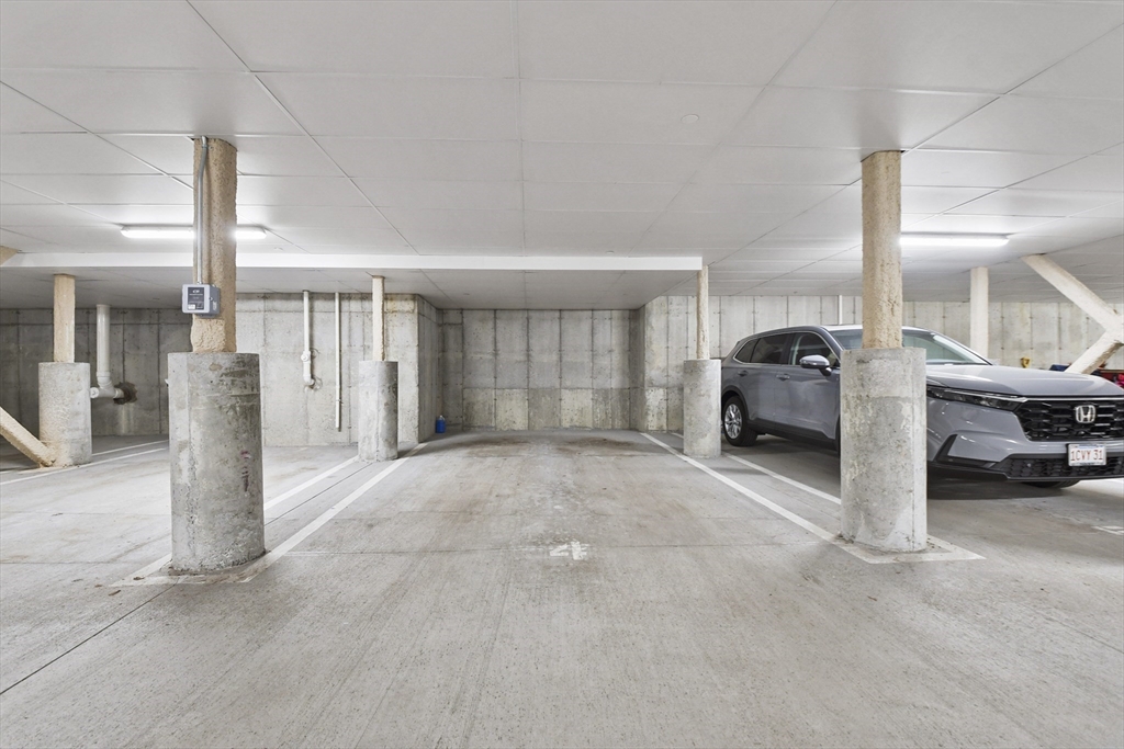 635 Old Post Road, Unit 108 Sharon, MA 02067 - Photo 41 of 42 a view of a car garage