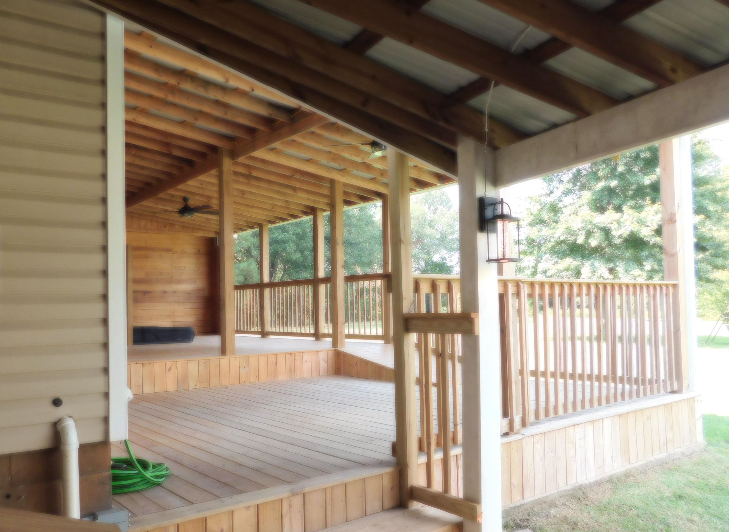 272 Brammer Road Covington, TN 38019 - Photo 28 of 31 a view of porch with wooden floor