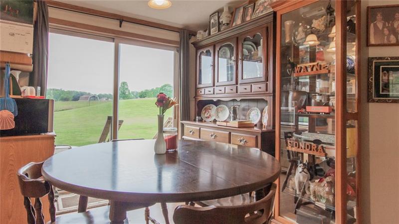 285 Cole Road Sandy Lake, PA 16145 - Photo 5 of 25 Dining room, sliding doors to back yard.