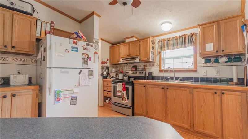 285 Cole Road Sandy Lake, PA 16145 - Photo 6 of 25 Lots of cabinetry and countertop space!