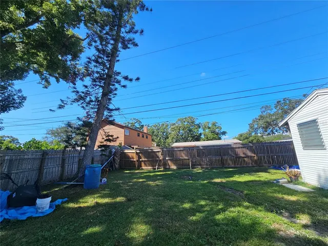 a view of a backyard with a garden