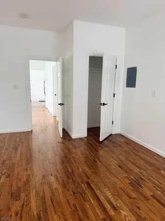 a view of a livingroom with wooden floor