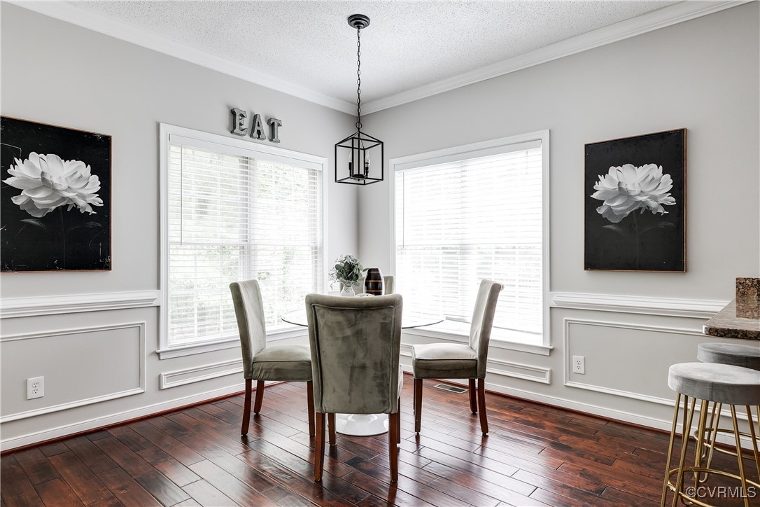 11201 Danforth Road Chesterfield, VA 23838 - Photo 11 of 31 a view of a dining room with furniture window and wooden floor