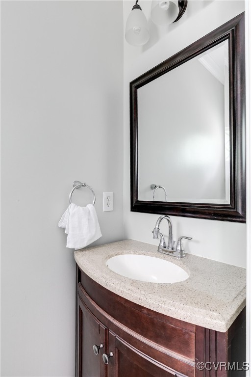 11201 Danforth Road Chesterfield, VA 23838 - Photo 12 of 31 a bathroom with a granite countertop sink and a mirror