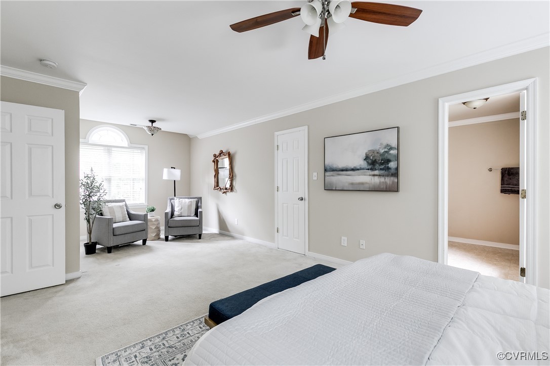 11201 Danforth Road Chesterfield, VA 23838 - Photo 17 of 31 a bedroom with a bed and white cabinets