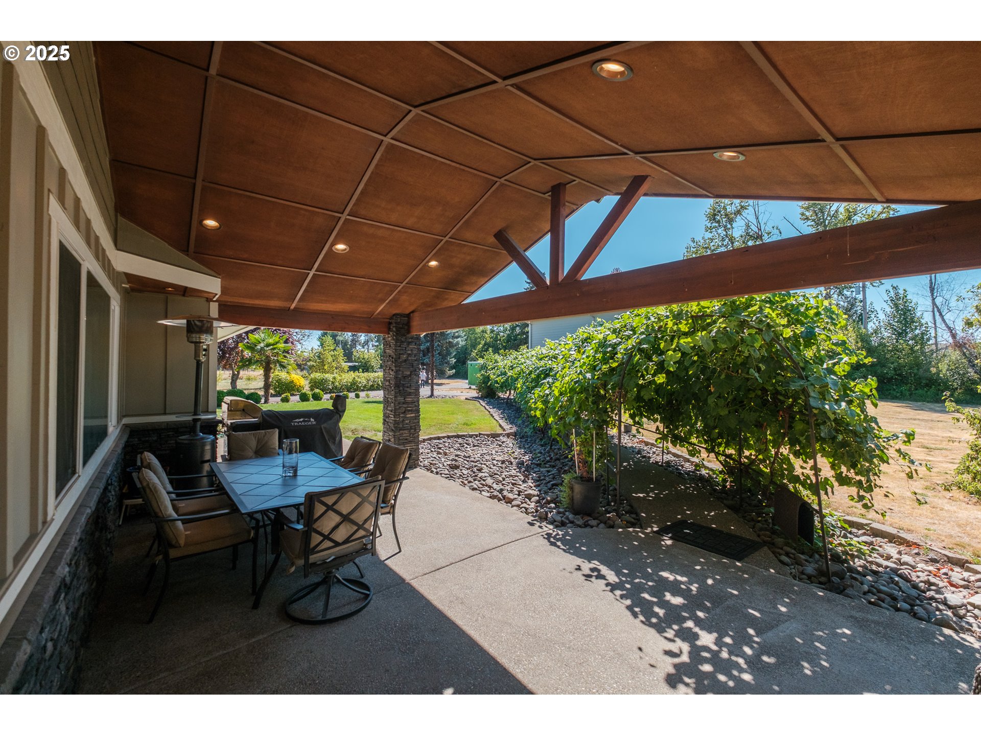 2225 Molalla Road Woodburn, OR 97071 - Photo 22 of 48 a patio with yard glass top table and chairs