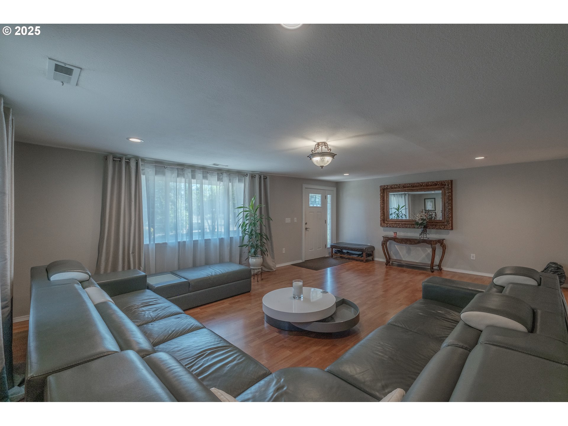 2225 Molalla Road Woodburn, OR 97071 - Photo 26 of 48 a living room with furniture and wooden floor