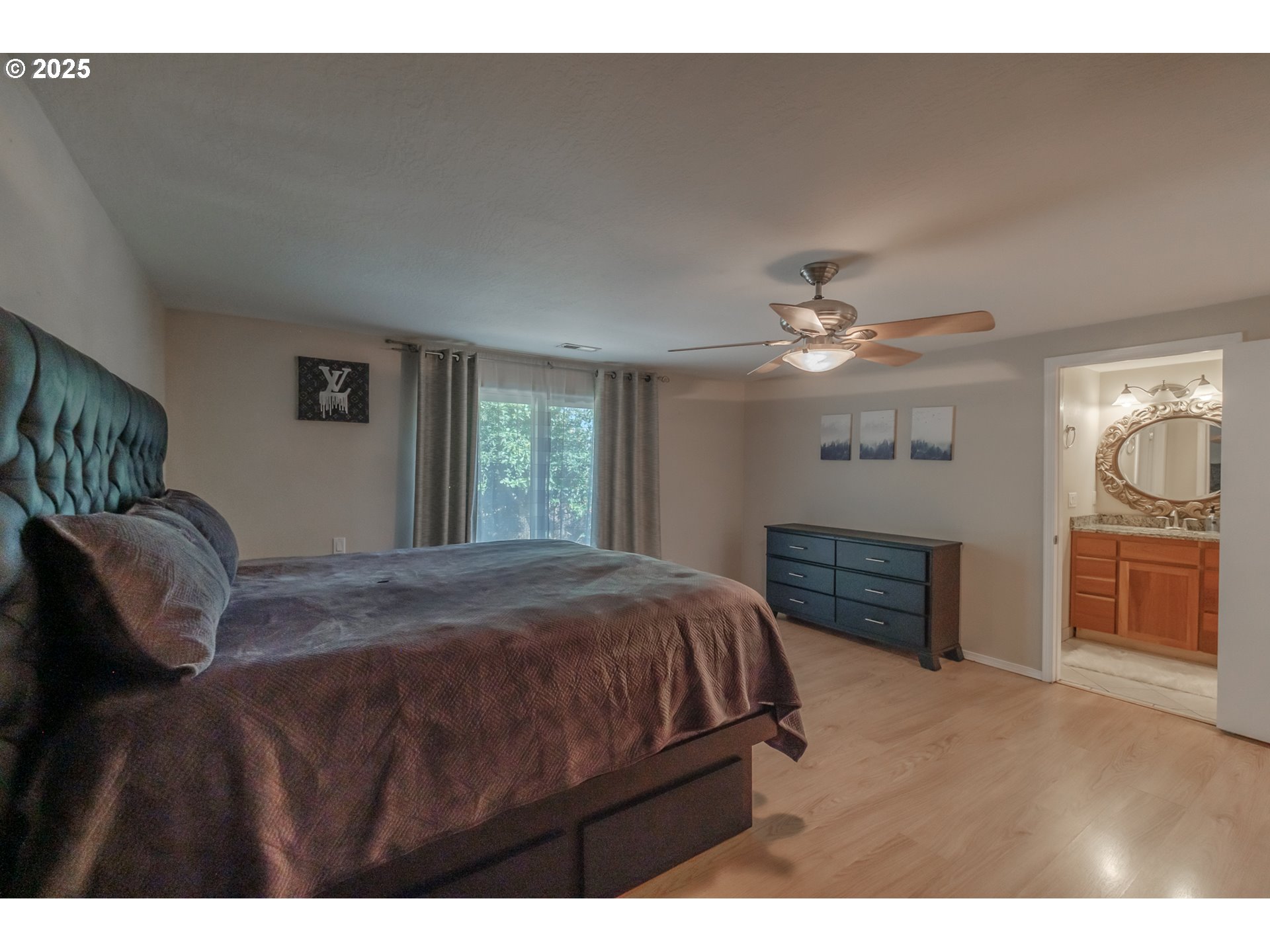 2225 Molalla Road Woodburn, OR 97071 - Photo 28 of 48 a bedroom with a bed and a fireplace