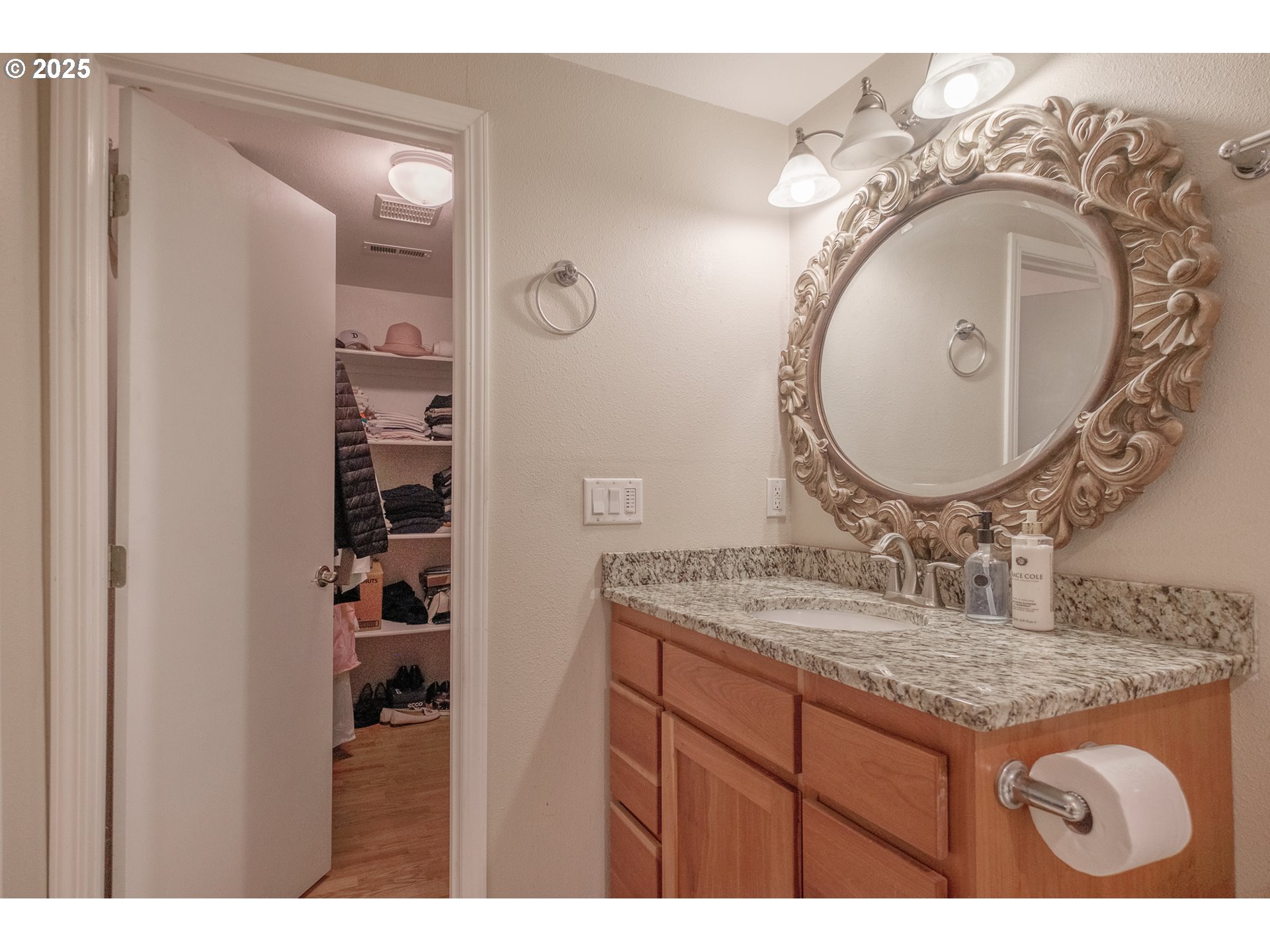 2225 Molalla Road Woodburn, OR 97071 - Photo 30 of 48 a bathroom with a granite countertop sink a mirror and vanity