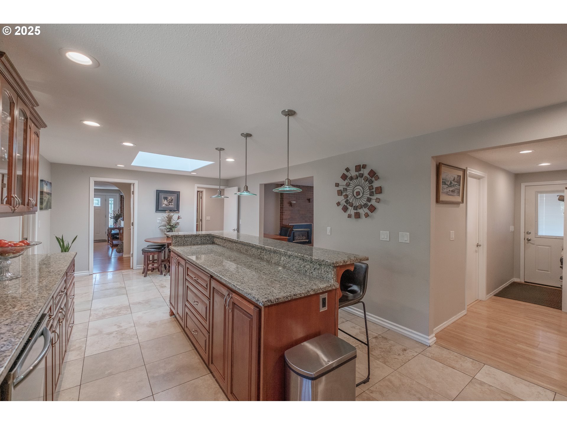 2225 Molalla Road Woodburn, OR 97071 - Photo 37 of 48 a open kitchen with cabinets and wooden floor