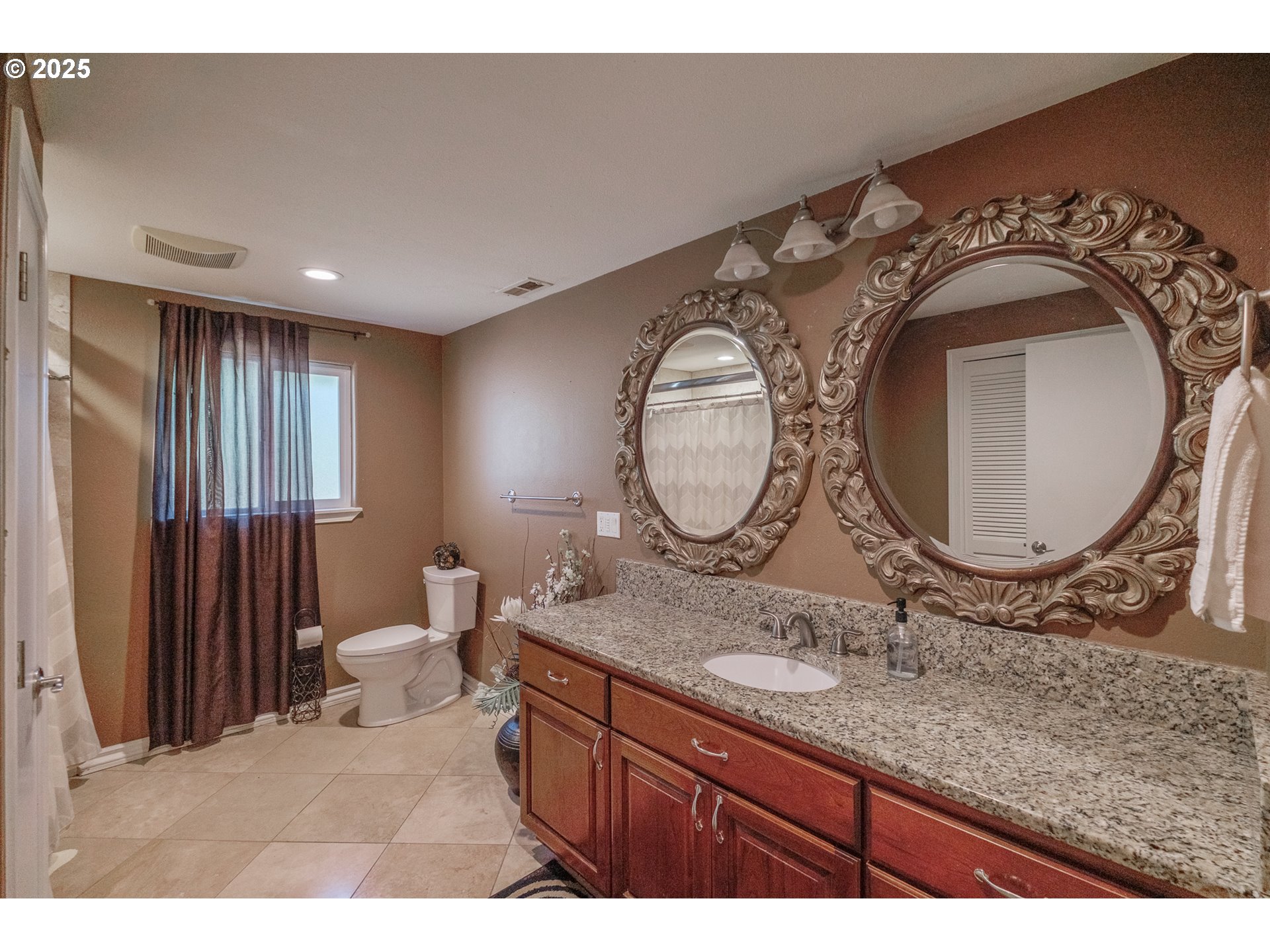2225 Molalla Road Woodburn, OR 97071 - Photo 44 of 48 a bathroom with a granite countertop double vanity sink and a mirror