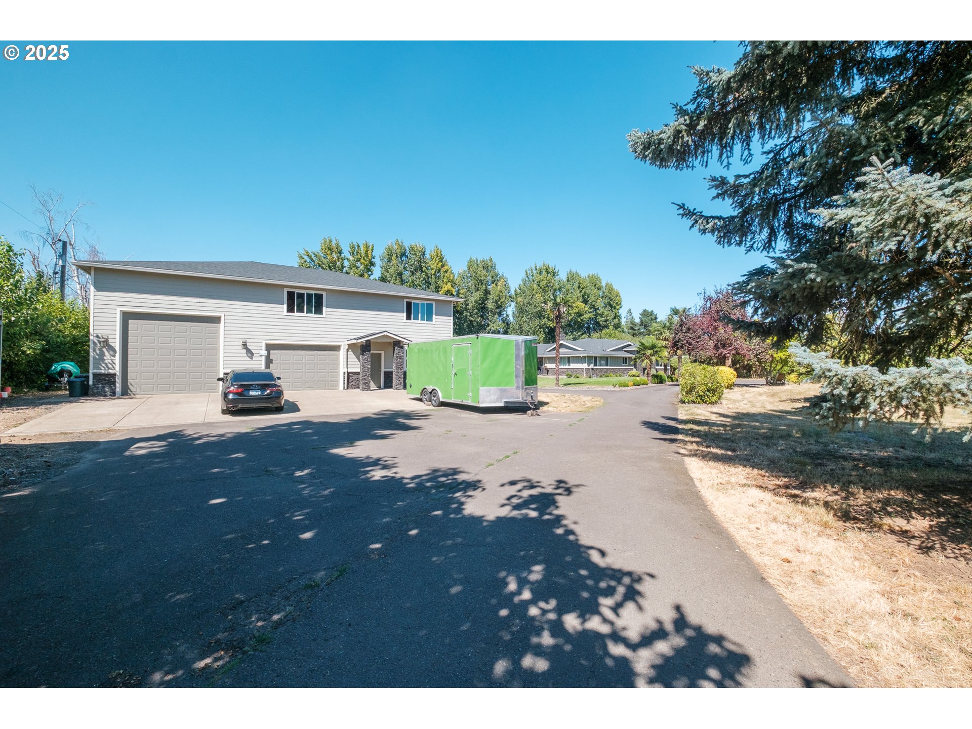 2225 Molalla Road Woodburn, OR 97071 - Photo 8 of 48 a view of a street with houses