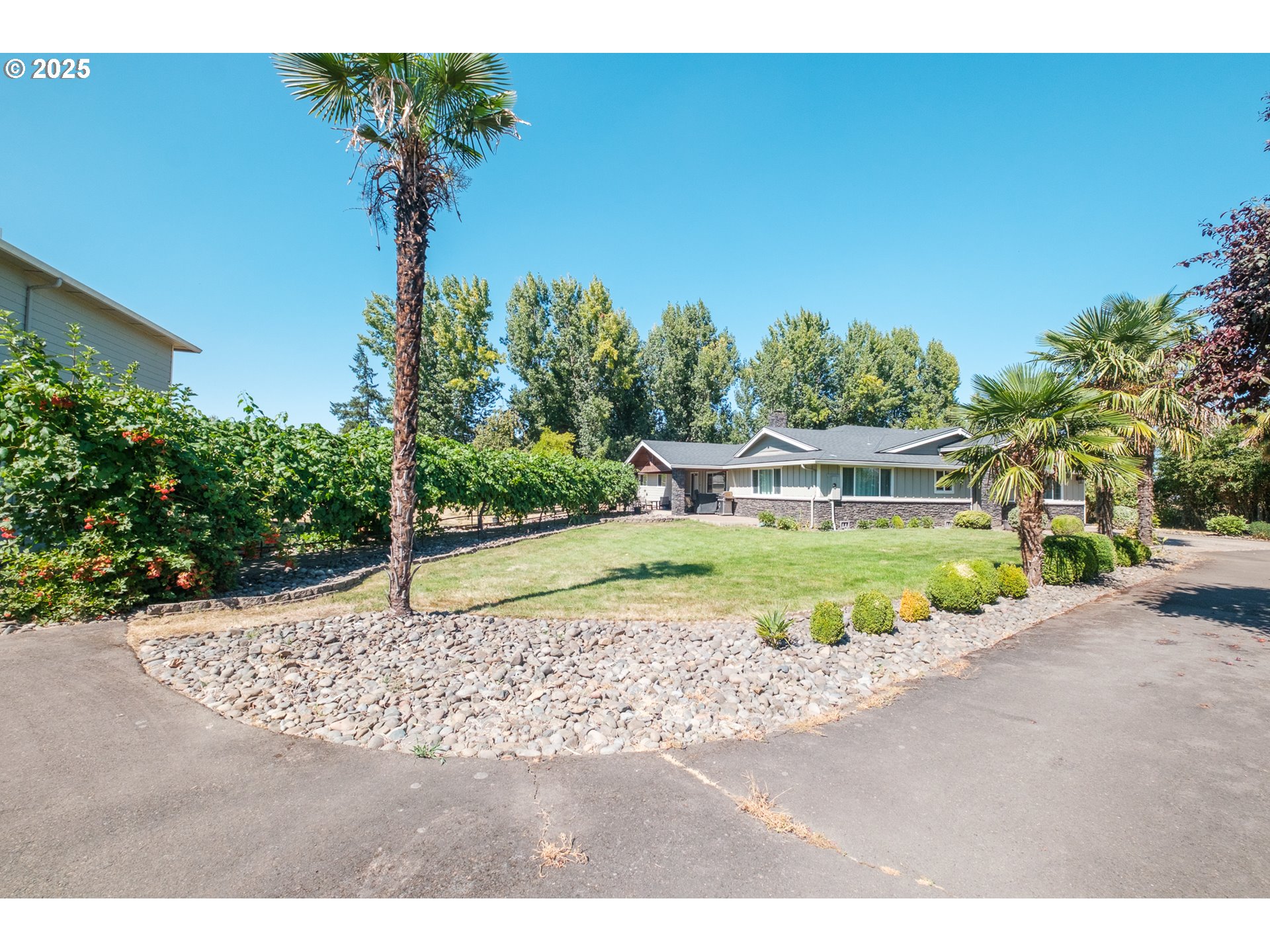 2225 Molalla Road Woodburn, OR 97071 - Photo 9 of 48 a view of a house with a yard