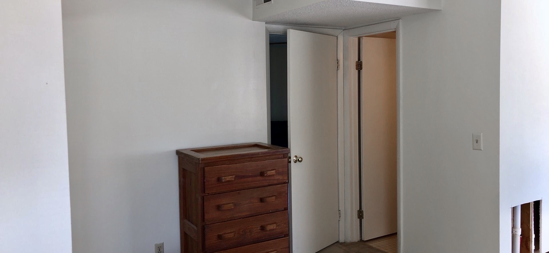 1346 Hunters Road, Unit C Harrisonburg, VA 22801 - Photo 12 of 15 a room with a dresser