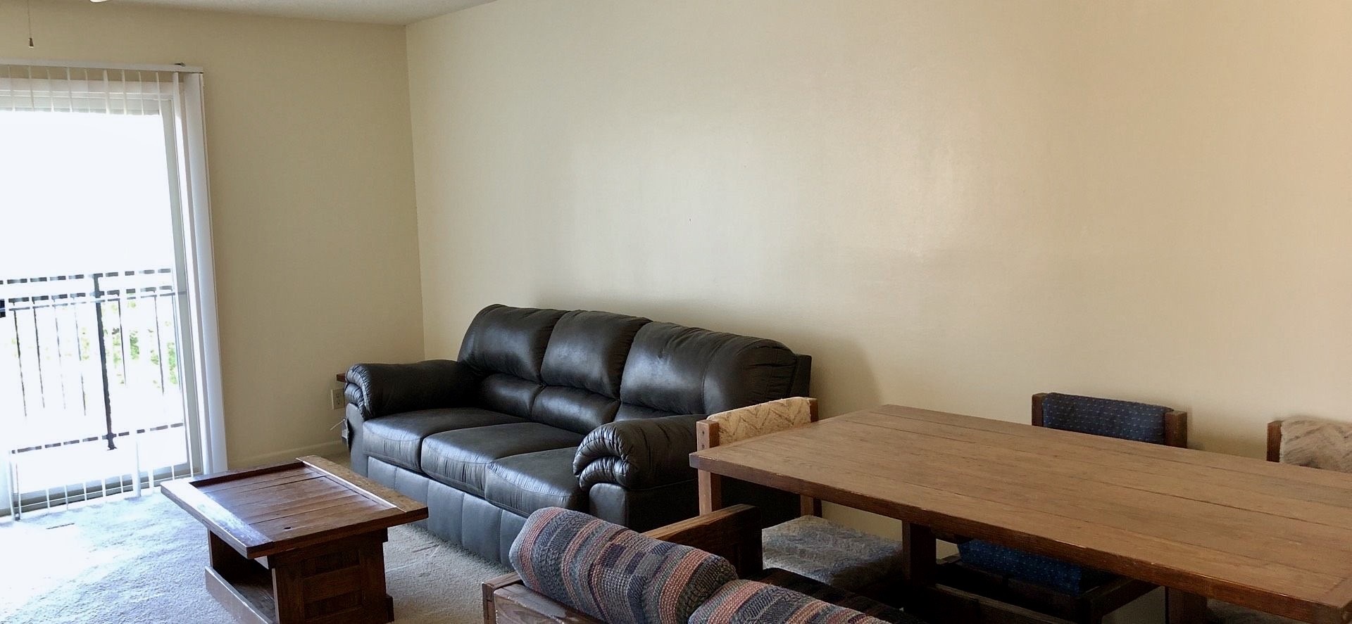 1346 Hunters Road, Unit C Harrisonburg, VA 22801 - Photo 6 of 15 a living room with furniture and wooden floor