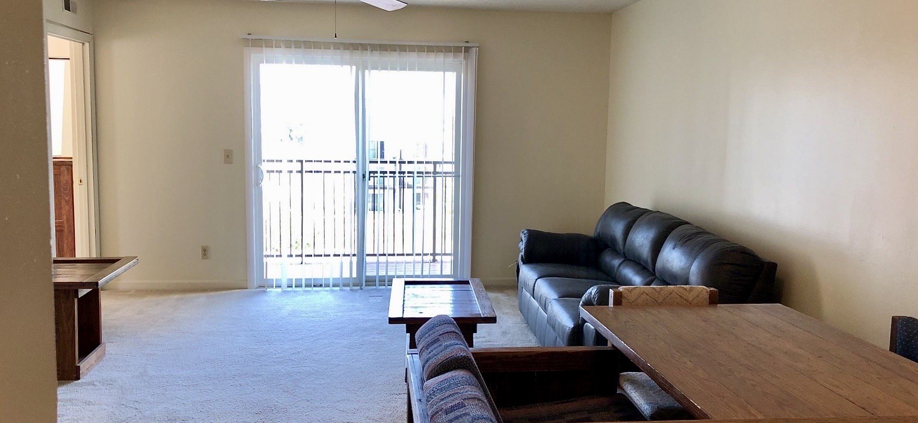 1346 Hunters Road, Unit C Harrisonburg, VA 22801 - Photo 7 of 15 a living room with furniture and a window